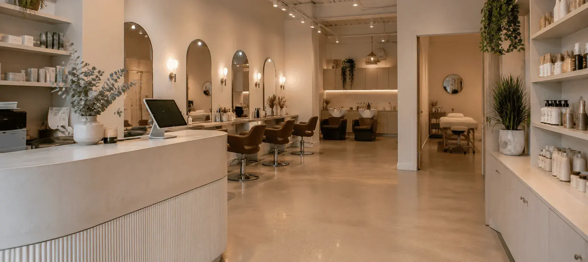 Beauty salon interior with styling stations