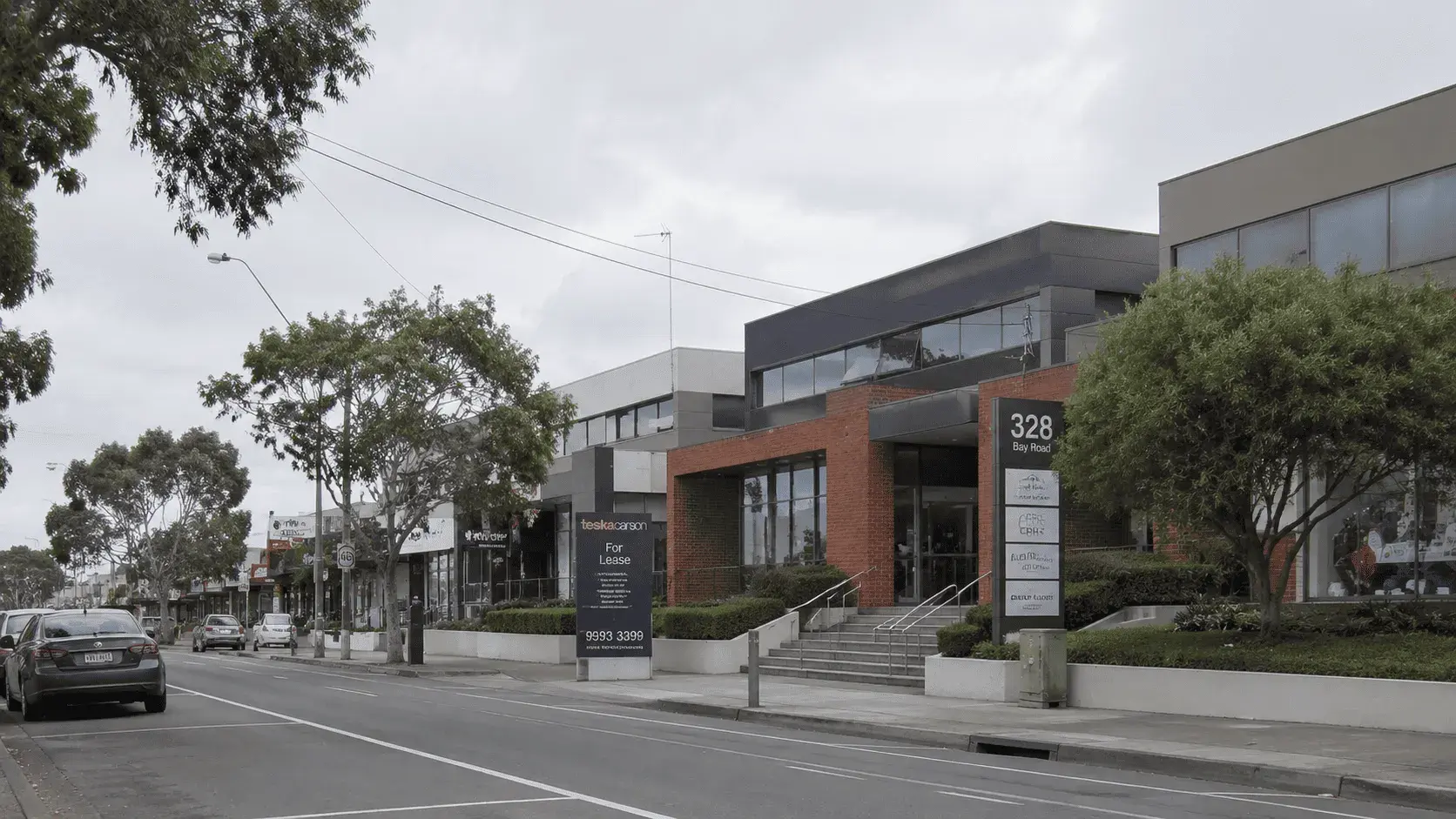 Cheltenham suburb street with shops and businesses